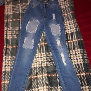 Women’s Fashion Nova distressed skinny jeans